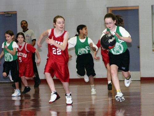 Emily playing basketball